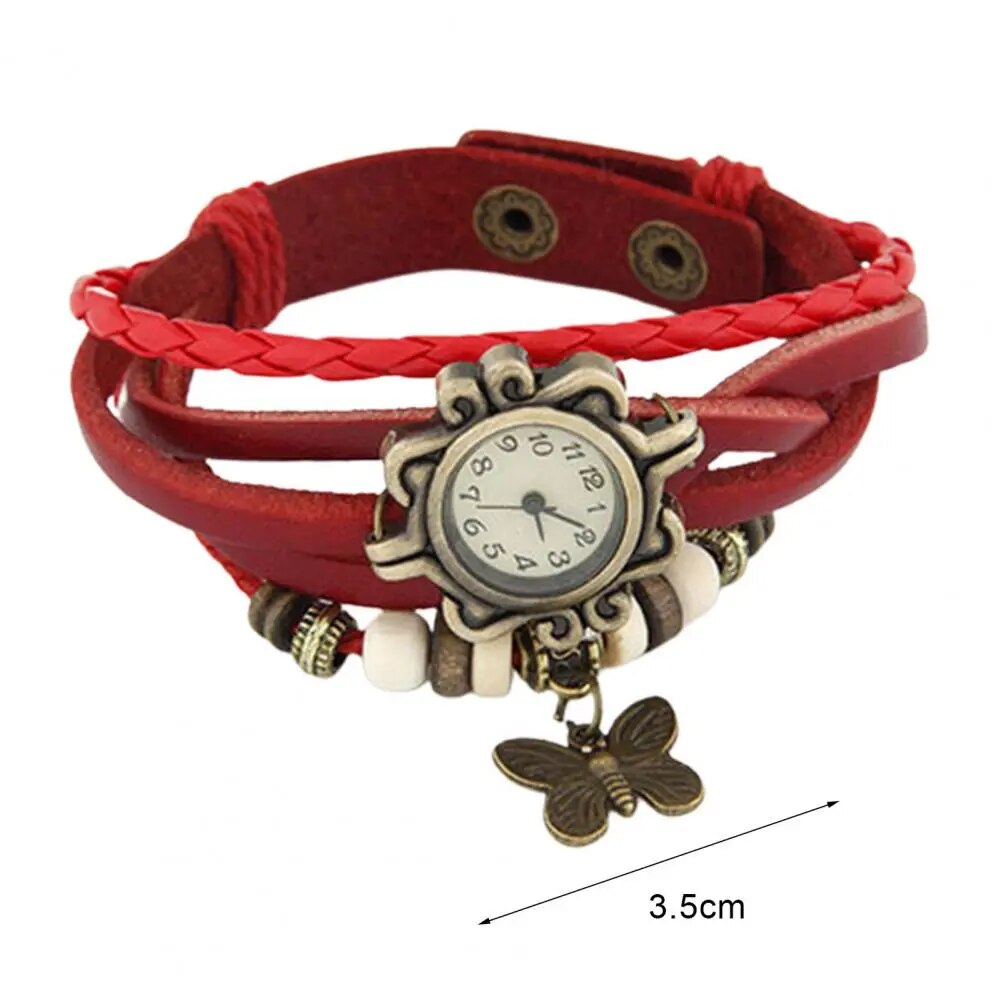Close-up of a women's vintage floral quartz watch showcasing the intricate flower pattern dial.