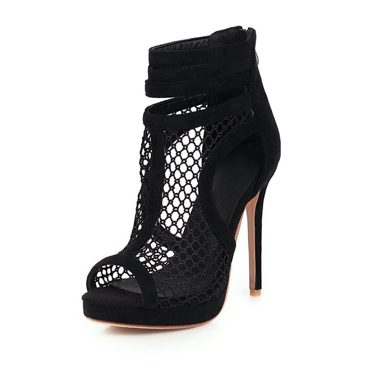 Women's high heel ankle boots, chic and stylish with a platform, perfect for night out fashion.