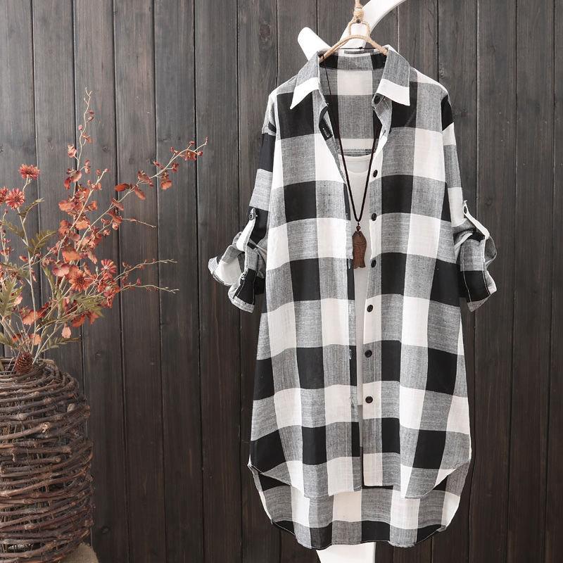 Women's plaid oversized shirt, longline button-up top for casual wear & stylish layering. Comfortable & versatile.