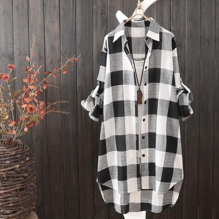 Women's plaid oversized shirt, longline button-up top for casual wear & stylish layering. Comfortable & versatile.