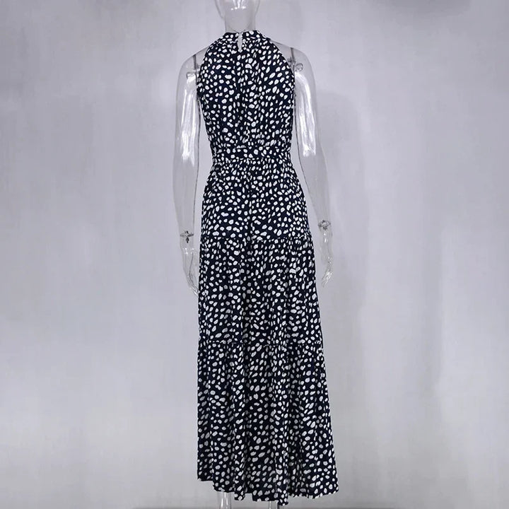 Flowy polka dot maxi dress, women's vacation fashion for summer.