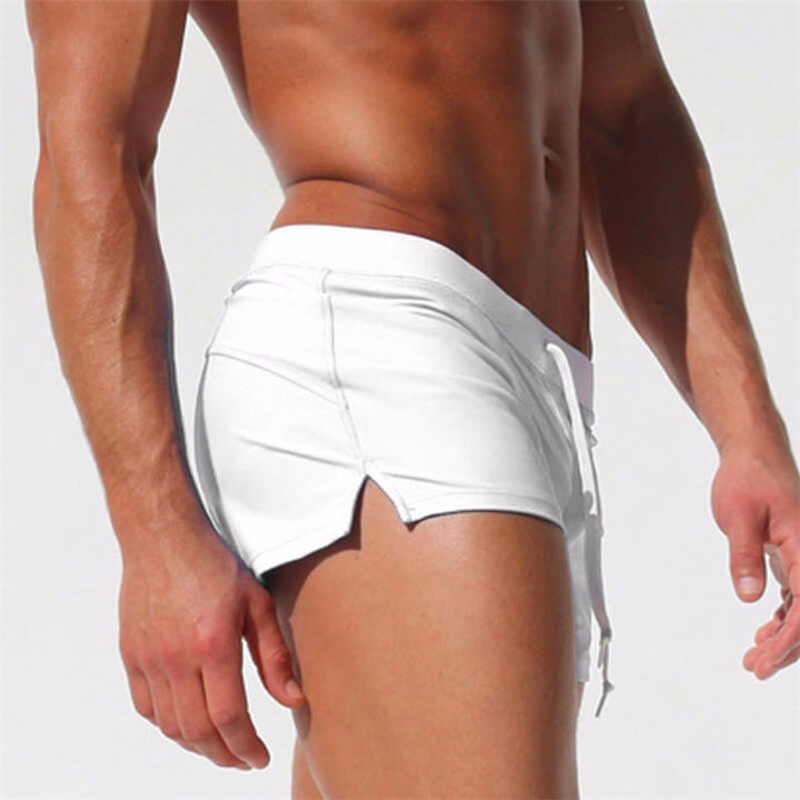 Men's modern quick-dry swim shorts with comfort waistband, perfect for beach & pool.