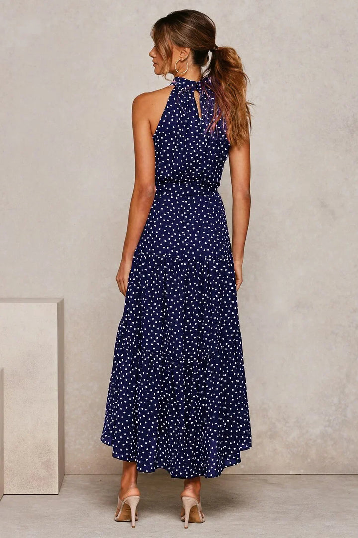 Elegant polka dot summer maxi dress, women's beach vacation style.