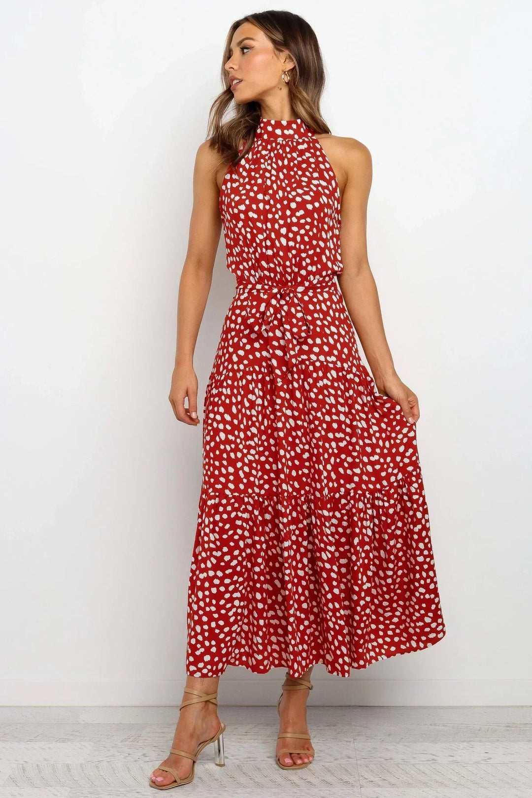 Polka dot summer beach dress, flowy and elegant women's fashion.
