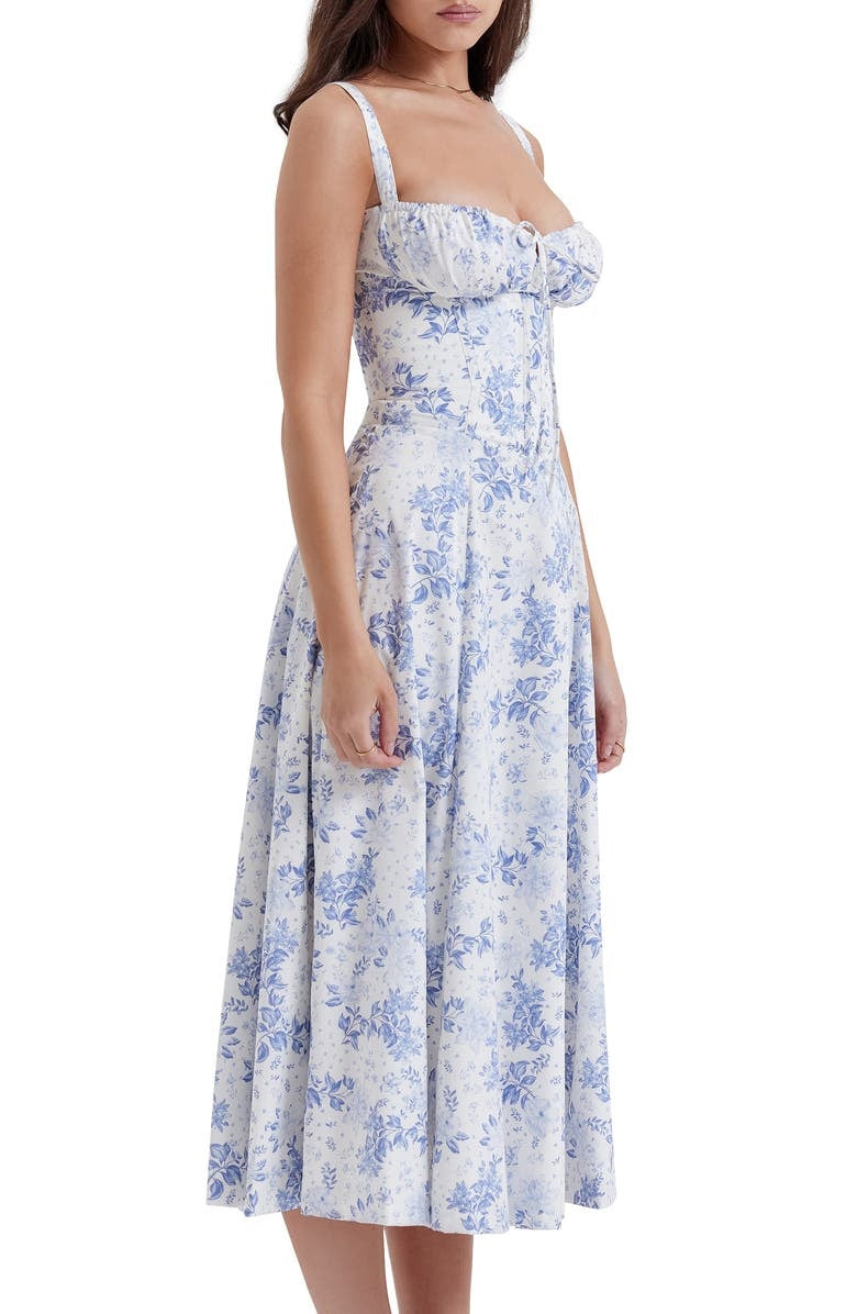 Spring casual floral midi dress for women, with a chic print. Ideal for everyday elegance.
