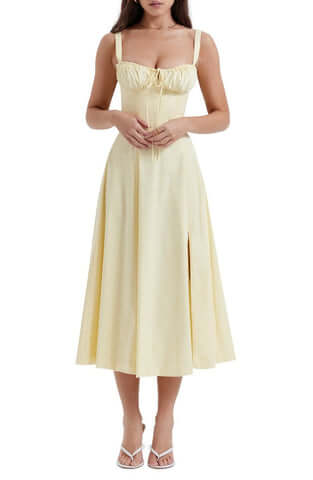 Elegant women's floral midi dress, featuring a lovely print for summer. Party or casual wear.