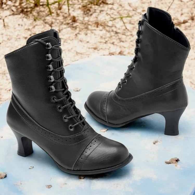Comfortable black Victorian mid-heel lace-up ankle boots with zipper, offering orthopedic support.