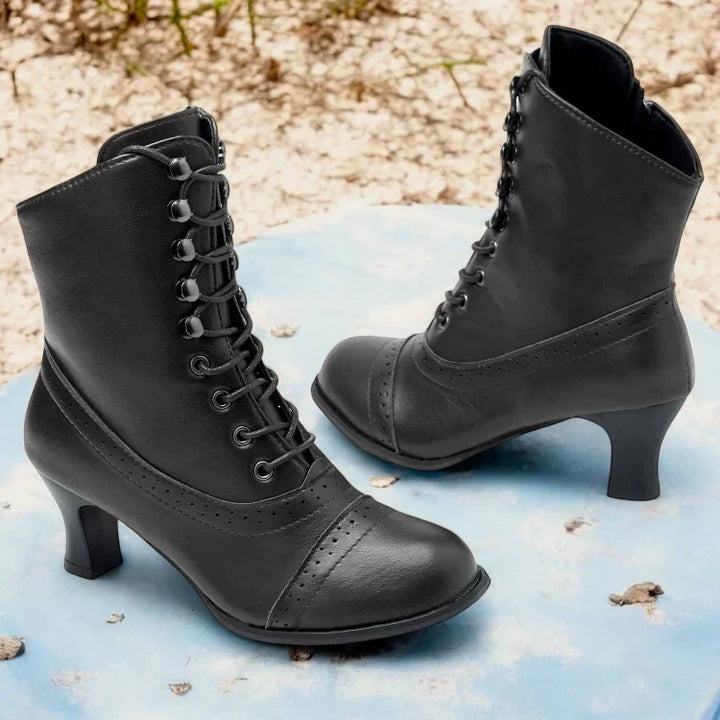 Comfortable black Victorian mid-heel lace-up ankle boots with zipper, offering orthopedic support.