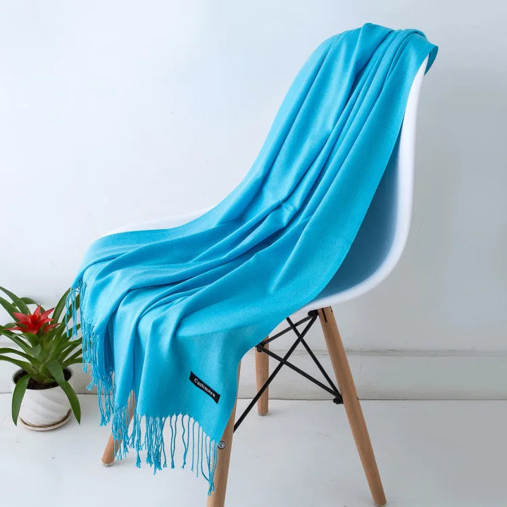 Elegant women's warm winter scarf, luxurious fabric, classic and stylish accessory.