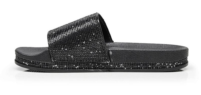 Sparkle footwear: women's sandals with crystal embellishments, chic summer slides.