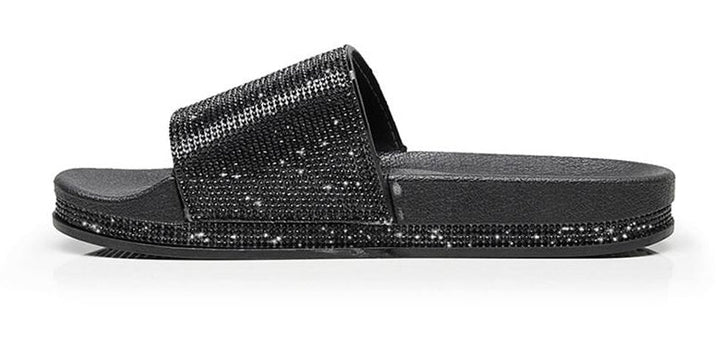 Sparkle footwear: women's sandals with crystal embellishments, chic summer slides.