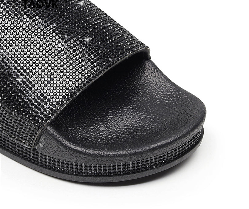 Stylish women's crystal slides, ideal for summer fashion & comfort.