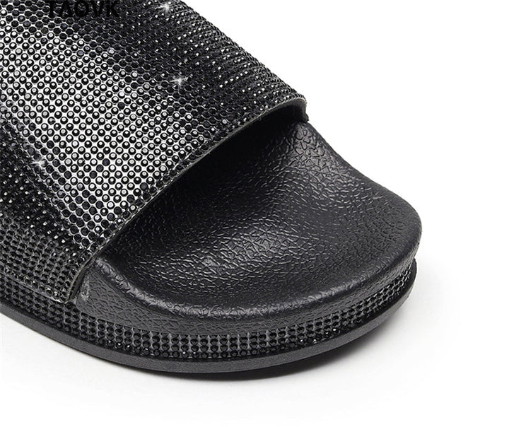 Stylish women's crystal slides, ideal for summer fashion & comfort.
