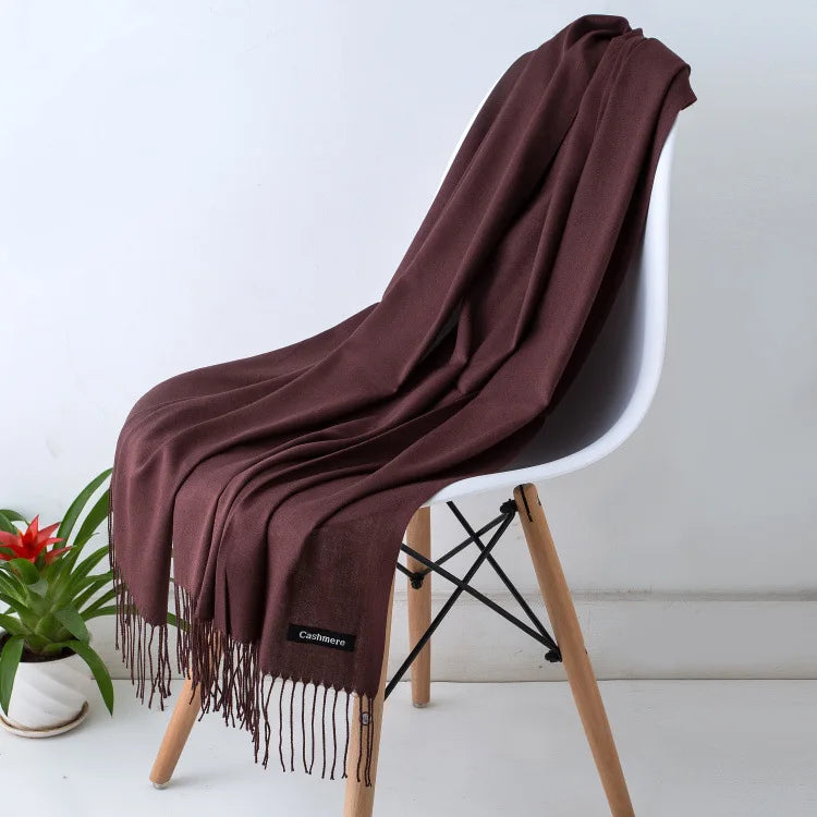Soft luxury women's scarf, elegant, warm, a classic fall/winter fashion accessory.