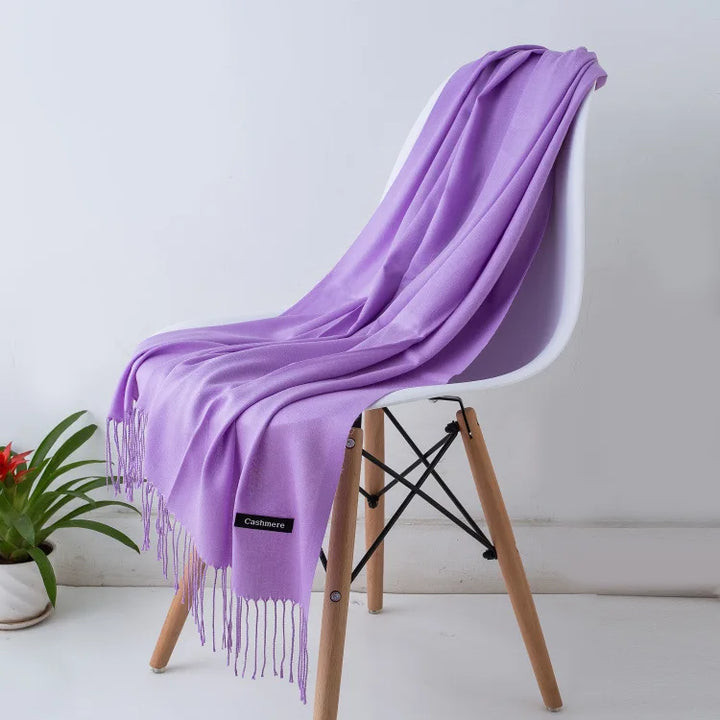 Luxurious women's scarf for winter, elegant, warm, and a chic fashion accessory.