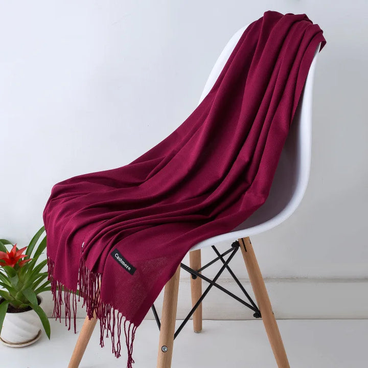 Elegant fall/winter scarf for women, warm, soft, and a luxurious fashion accessory.