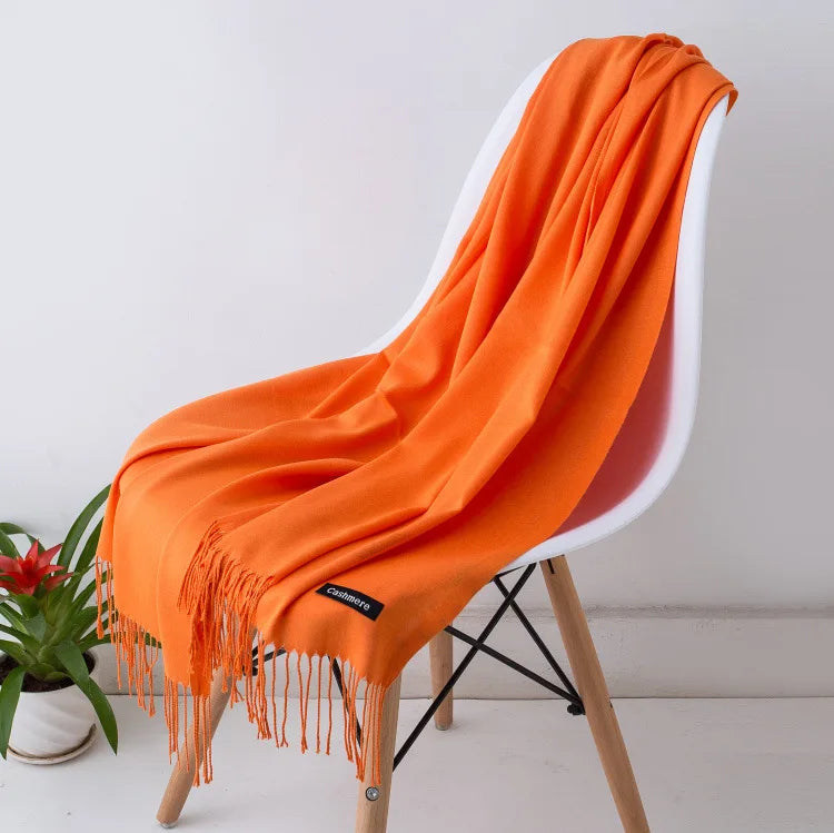 Elegant women's warm accessory, a luxurious fall/winter scarf in classic style.