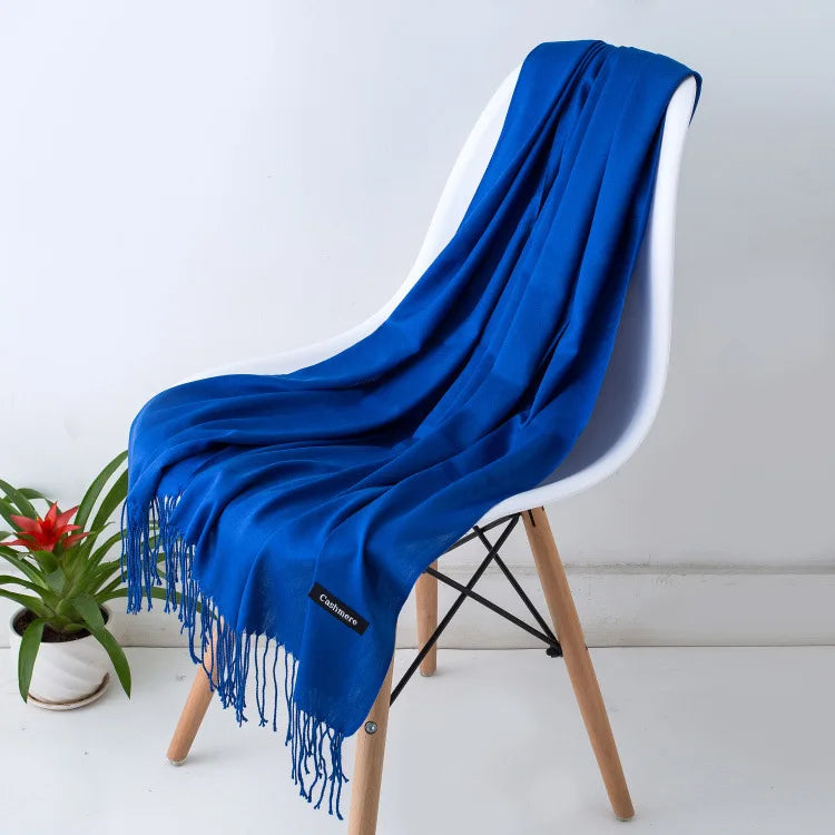 Women's fall/winter elegant scarf, warm, luxurious, and a soft fashion accessory.