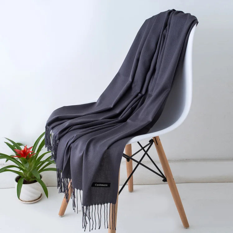 Elegant women's warm accessory, luxurious scarf, soft touch for fall/winter.