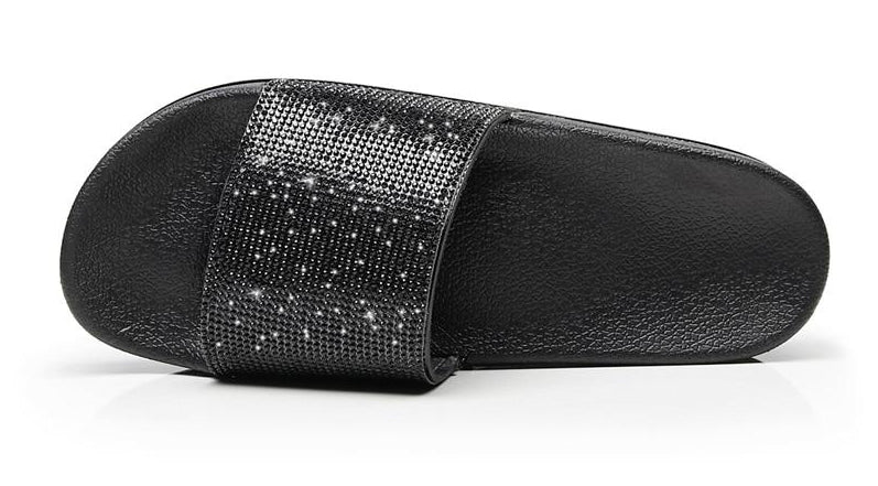 Women's casual slides featuring sparkling crystal detailing, stylish summer wear.