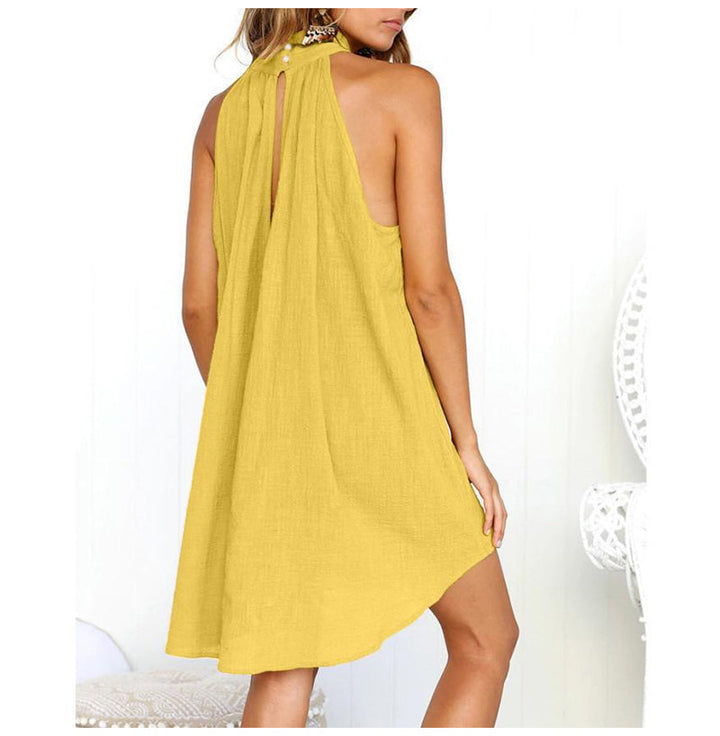 Elegant women's sleeveless dress with classic collar & stylish pleats, perfect for chic summer fashion.