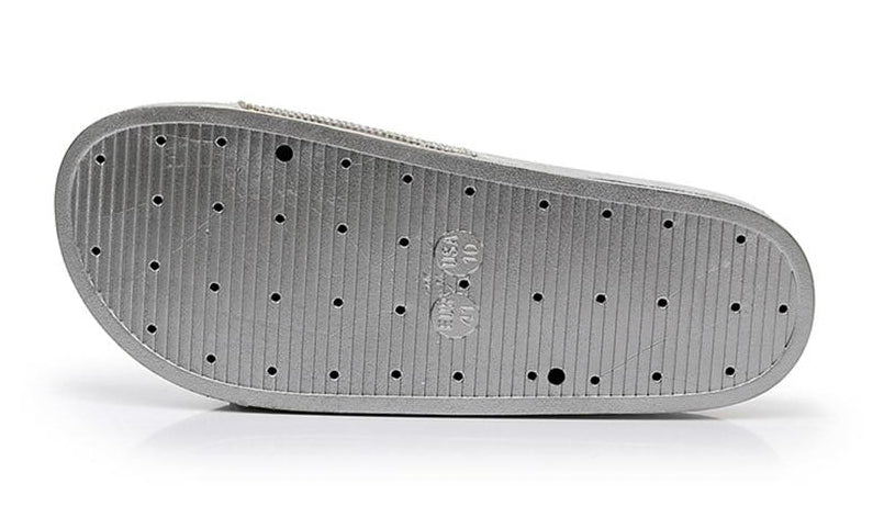Comfortable women's slides with sparkling crystal straps, perfect for casual elegance.