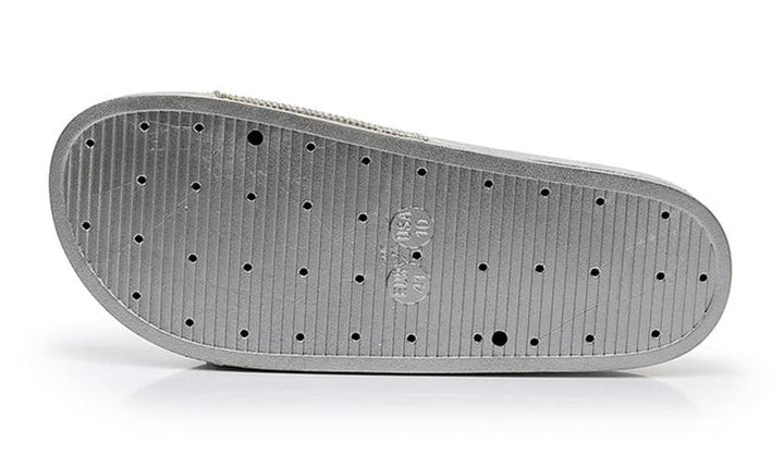 Comfortable women's slides with sparkling crystal straps, perfect for casual elegance.
