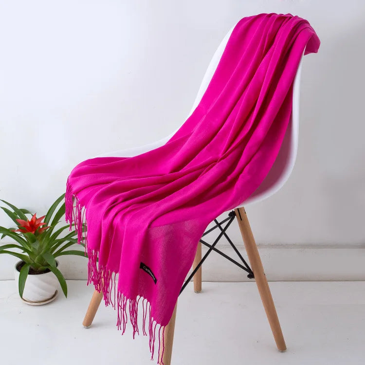 Warm women's elegant scarf, classic style, luxurious feel, ideal for winter fashion.
