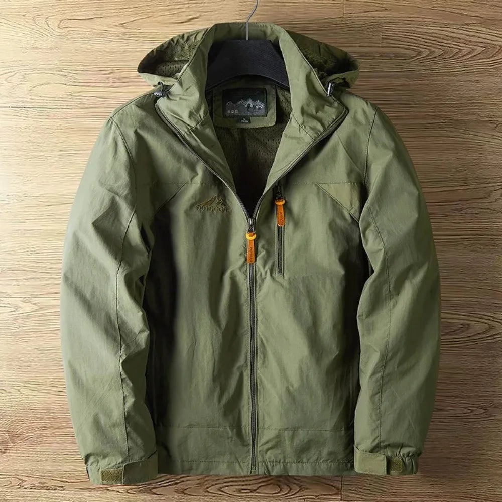 Weatherproof men's hooded rain jacket, ideal for hiking & travel. Lightweight, waterproof, full zip.