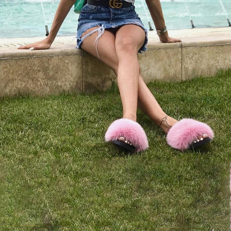 Women's fluffy open-toe slide sandals. Soft plush comfort slippers for home loungewear.