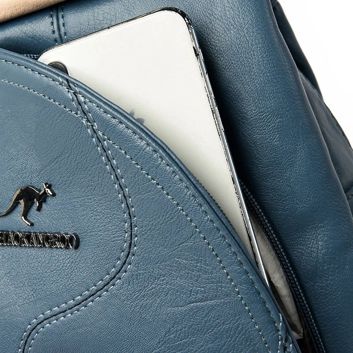 Elegant women's leather backpack, anti-theft design with secure zippers, a versatile travel handbag.