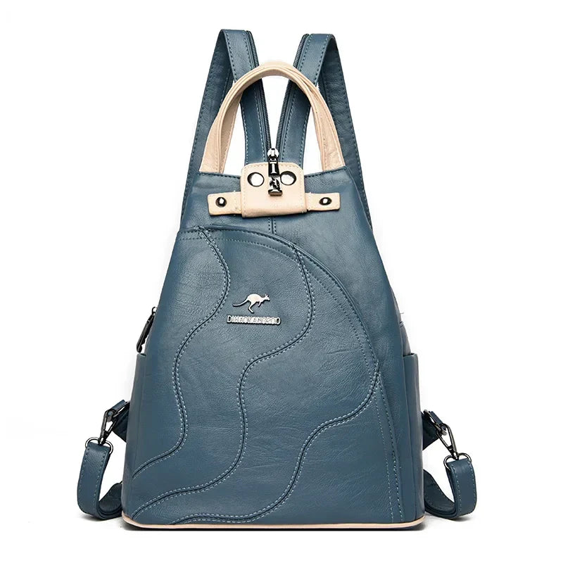 Women's anti-theft leather backpack, secure zipper closure for safe travel and everyday carry.