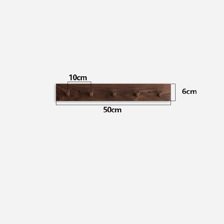 Modern zen style wooden coat rack, handmade minimalist wall organizer for an elegant entryway.
