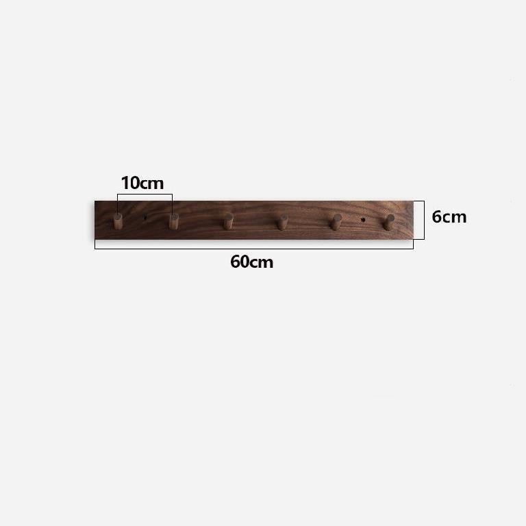 Japandi inspired handmade wooden wall coat rack, a minimalist entryway organizer with natural aesthetic.