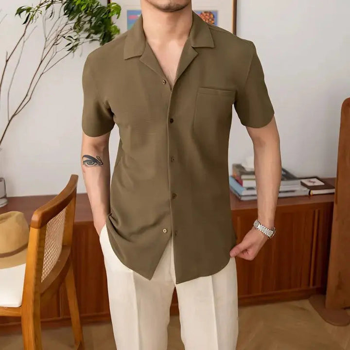 Stylish men's short sleeve open collar shirt. Features a relaxed fit & textured fabric, great for everyday wear.