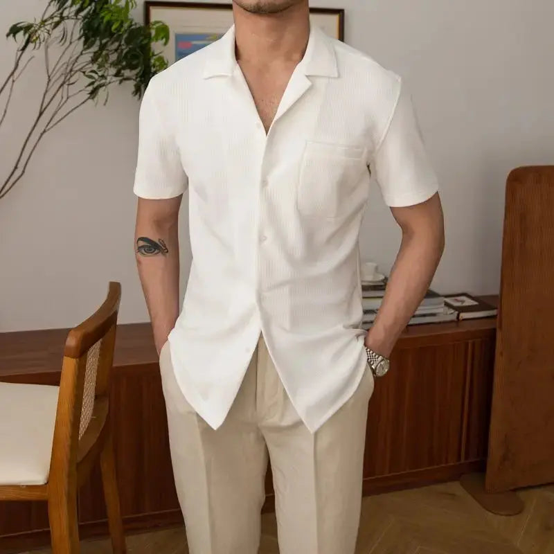 Versatile men's textured button-up shirt with an open collar & short sleeves. Perfect for smart casual or summer outfits.