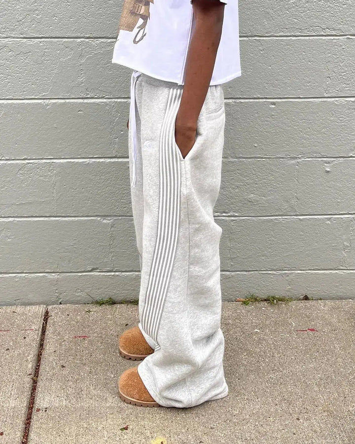 Stylish men's retro striped joggers for streetwear fashion & active comfort. Sporty athletic design.