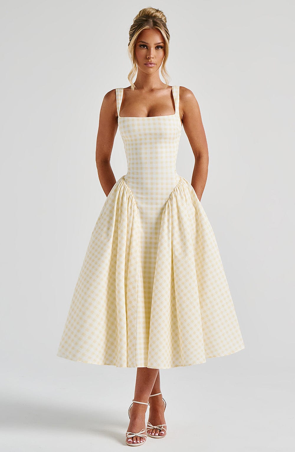 Women's sleeveless square neck gingham midi dress, comfortable & elegant for summer, day outings, or smart casual wear.