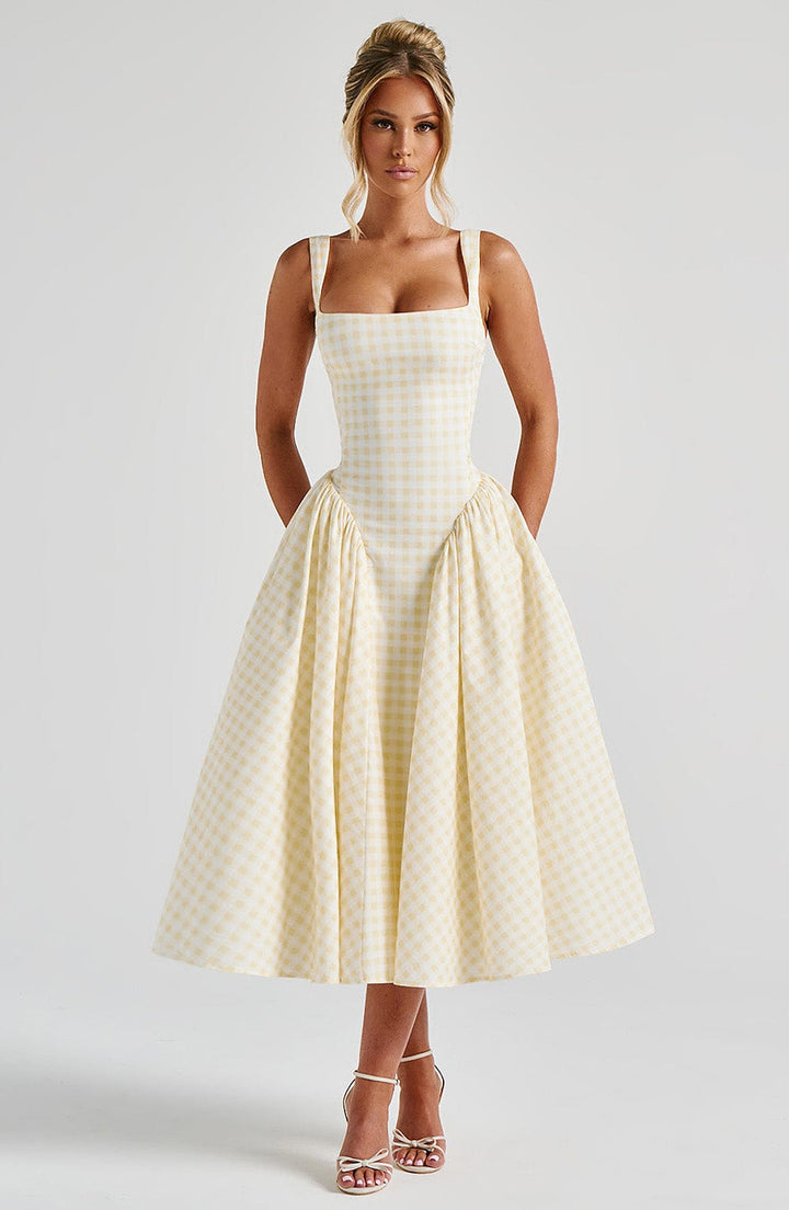 Women's sleeveless square neck gingham midi dress, comfortable & elegant for summer, day outings, or smart casual wear.