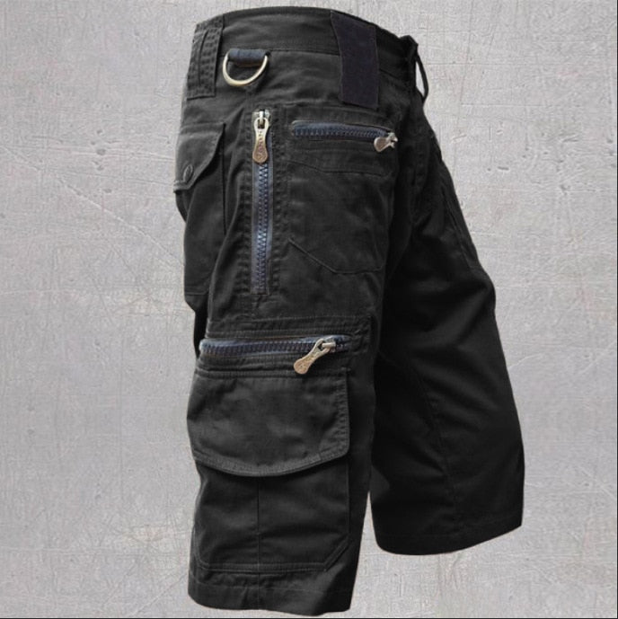 Close-up of a woman's comfortable cargo shorts in a neutral color, showcasing pockets & casual style.