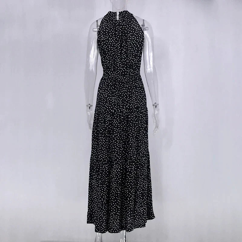 Women's elegant polka dot summer dress, flowy and comfortable.