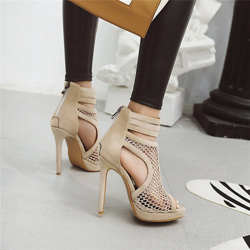 Stylish black platform ankle boots with a high heel, ideal for chic night out outfits.