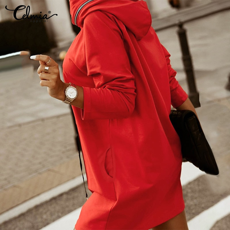 Trendy women's oversized hoodie dress, streetwear inspired with zip detail. Perfect for a casual, relaxed look.