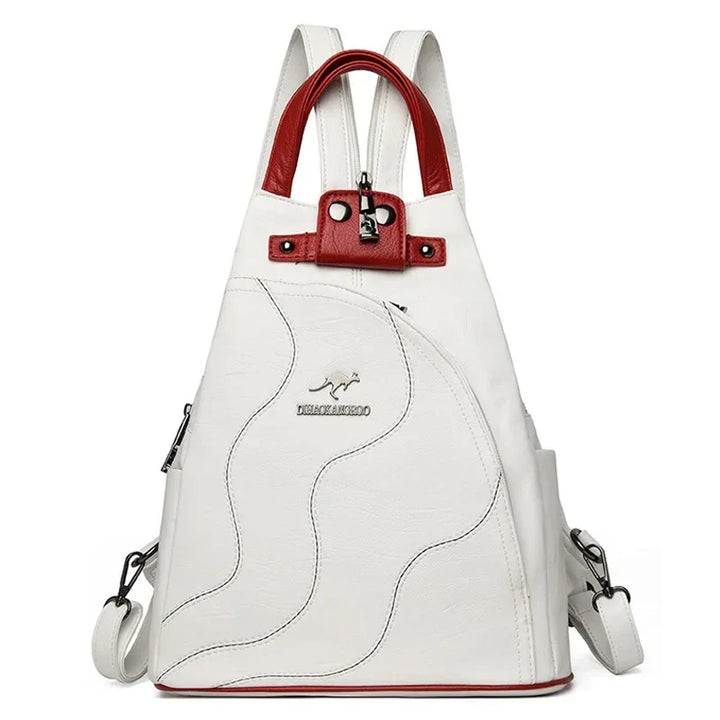 Stylish women's leather anti-theft backpack, featuring secure zippers for safe travel & everyday use.