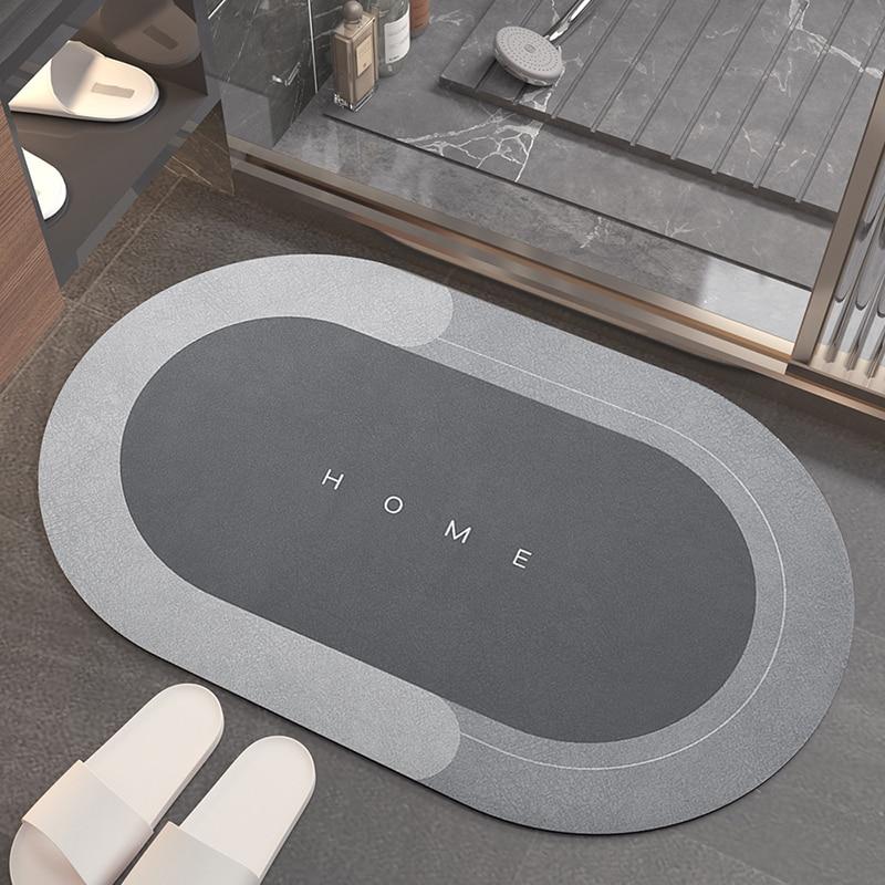 Super absorbent, quick-drying bath mat from diatomaceous earth; non-slip for bathroom safety.
