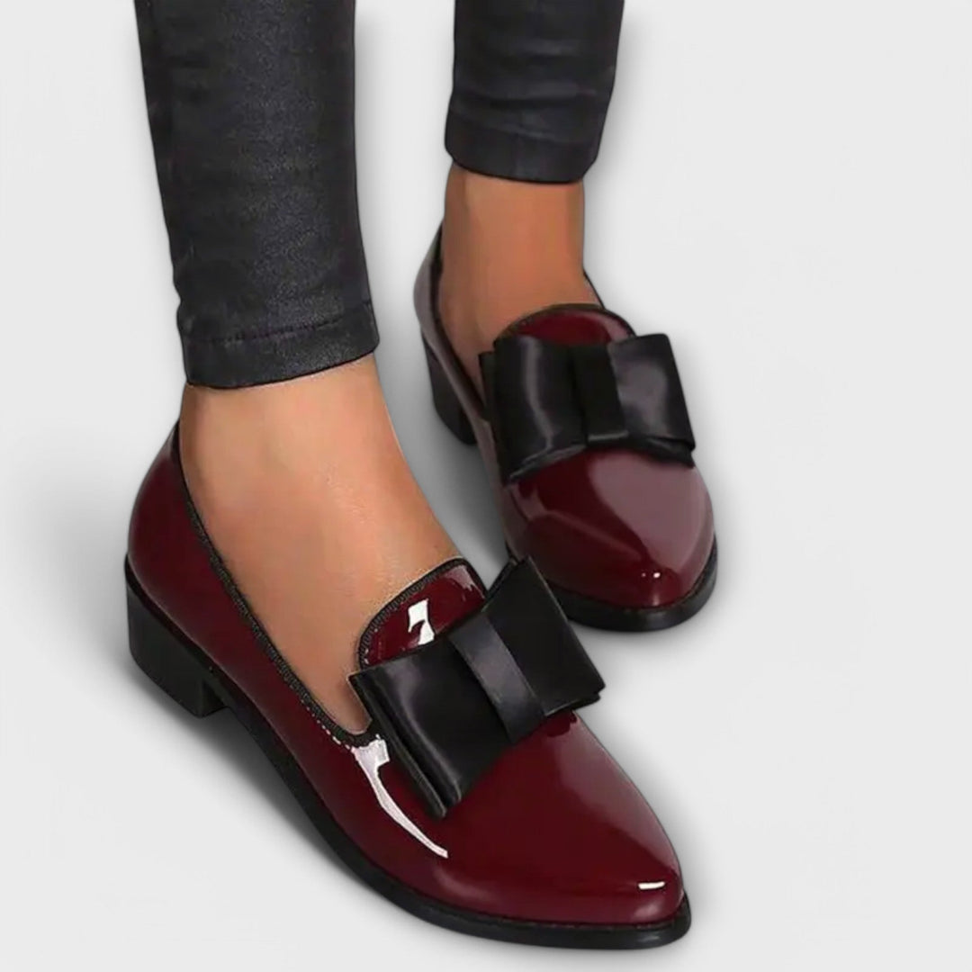 Practical & stylish women's black moccasins, versatile slip-on casual footwear ideal for all-day comfort.