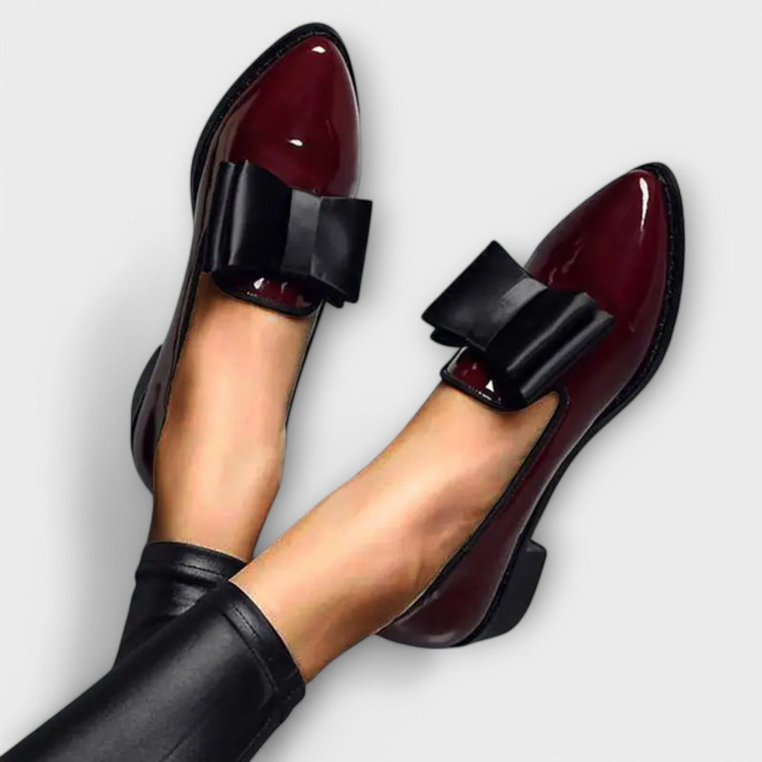 Women's stylish brown leather moccasins, comfortable slip-on loafers perfect for everyday casual wear.