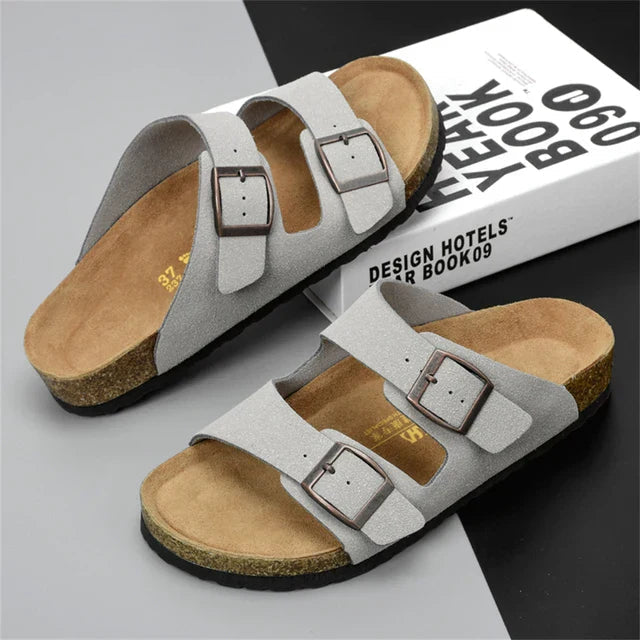 Classic men's casual slides with adjustable double buckle straps and a cushioned comfort footbed.
