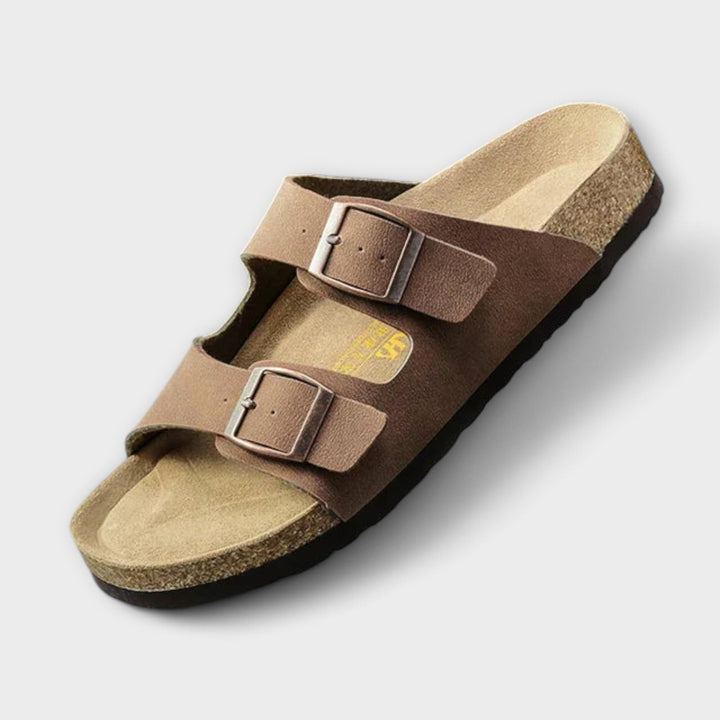 Stylish women's comfort sandals featuring robust orthopaedic arch support & cushioned footbed.