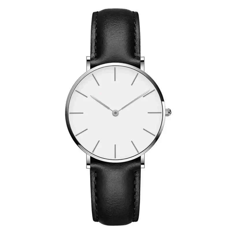 Stylish women's round leather watch, minimalist, timeless classic, perfect elegant wrist accessory.